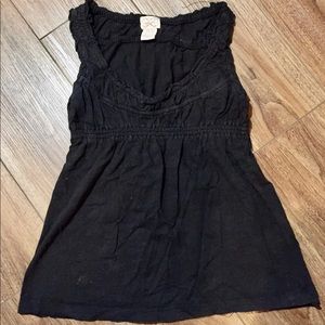 Black ruffle front top